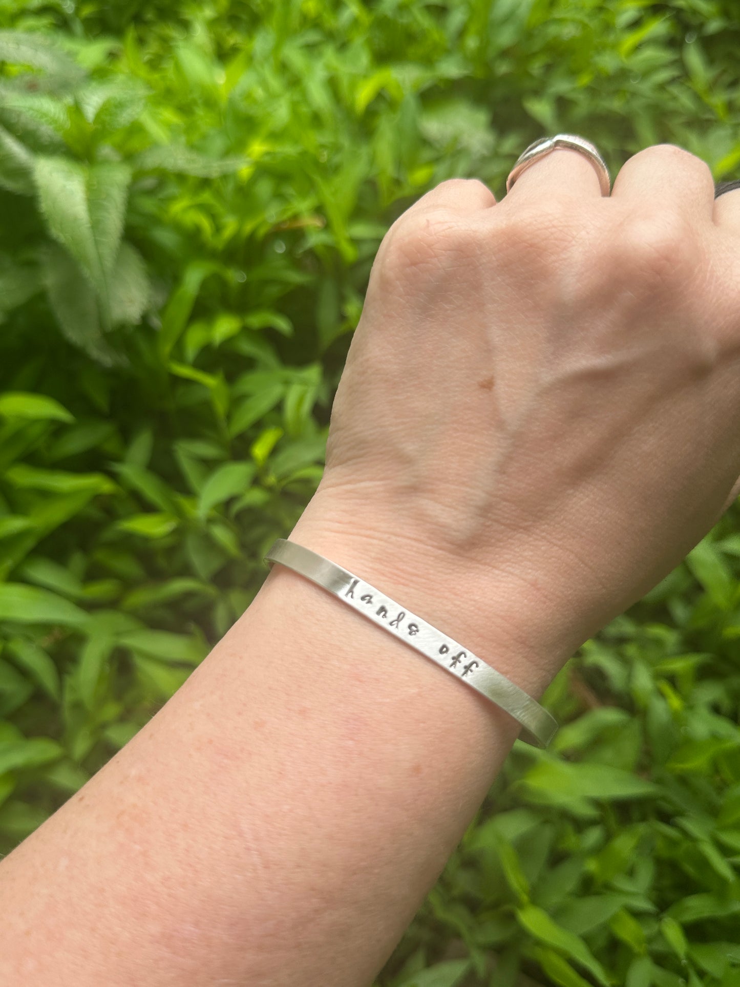 good trouble // resist // hands off cuffs