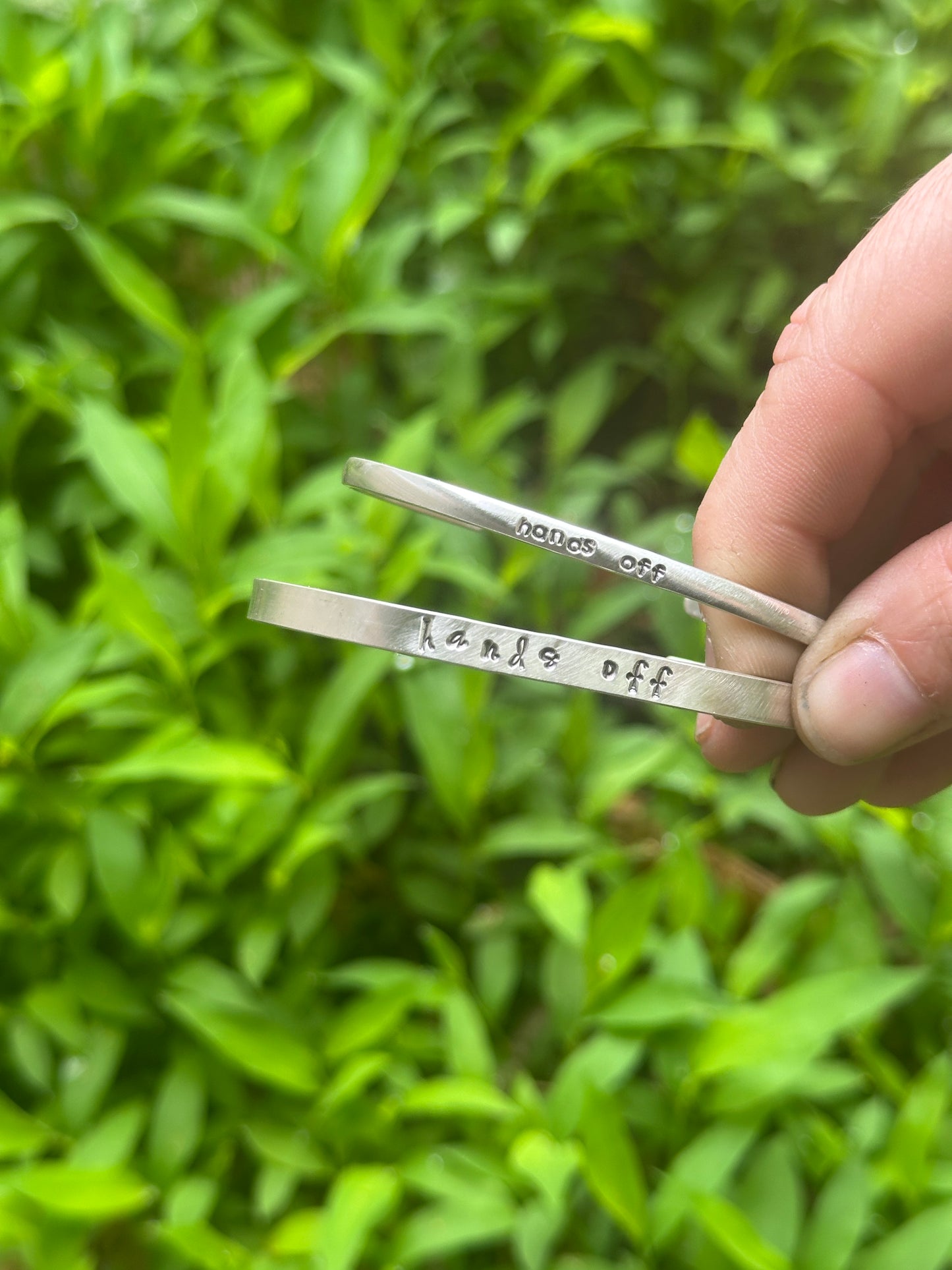 good trouble // resist // hands off cuffs