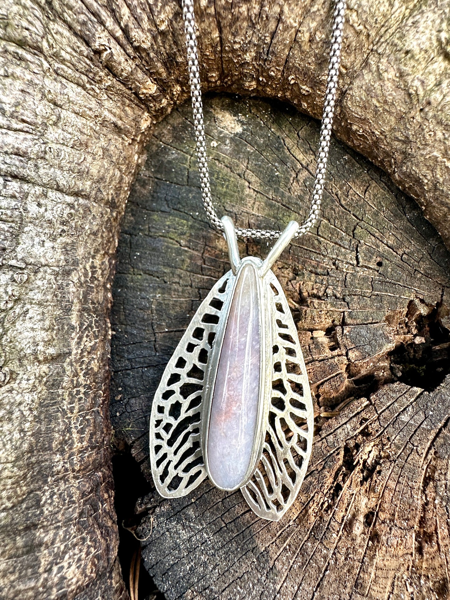 Fossilized coral winged necklace