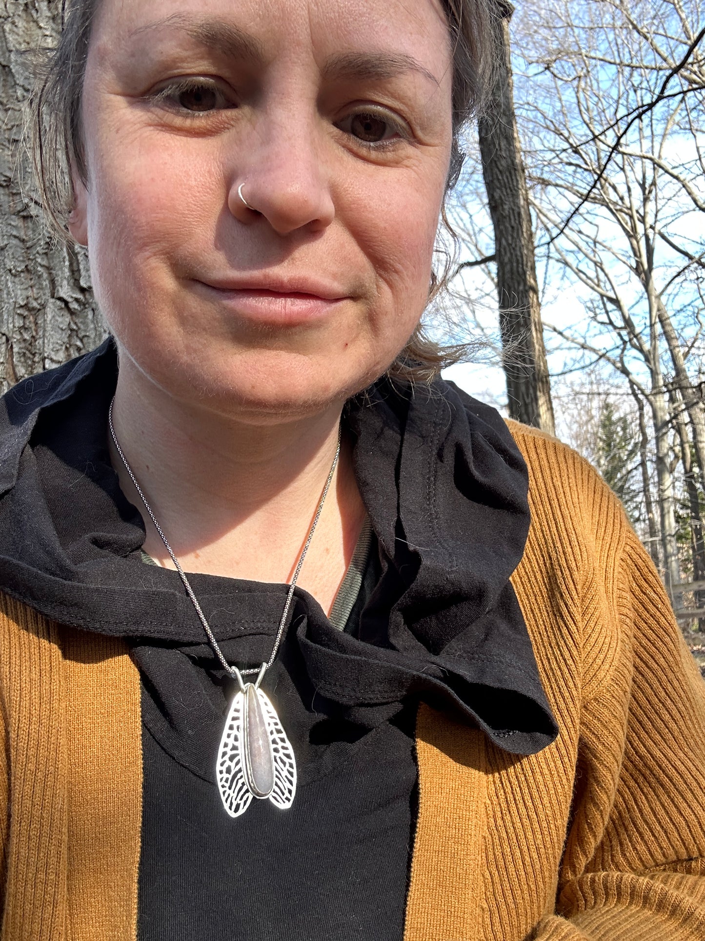 Fossilized coral winged necklace