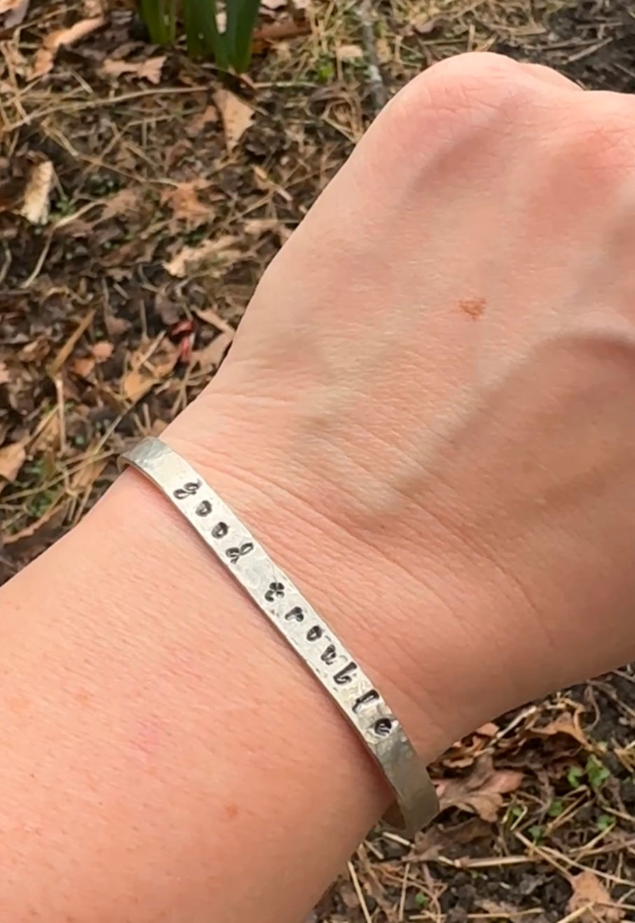 good trouble // resist // hands off cuffs