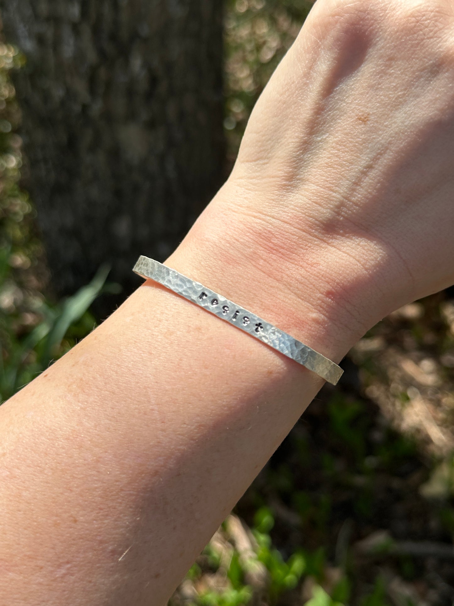 good trouble // resist // hands off cuffs